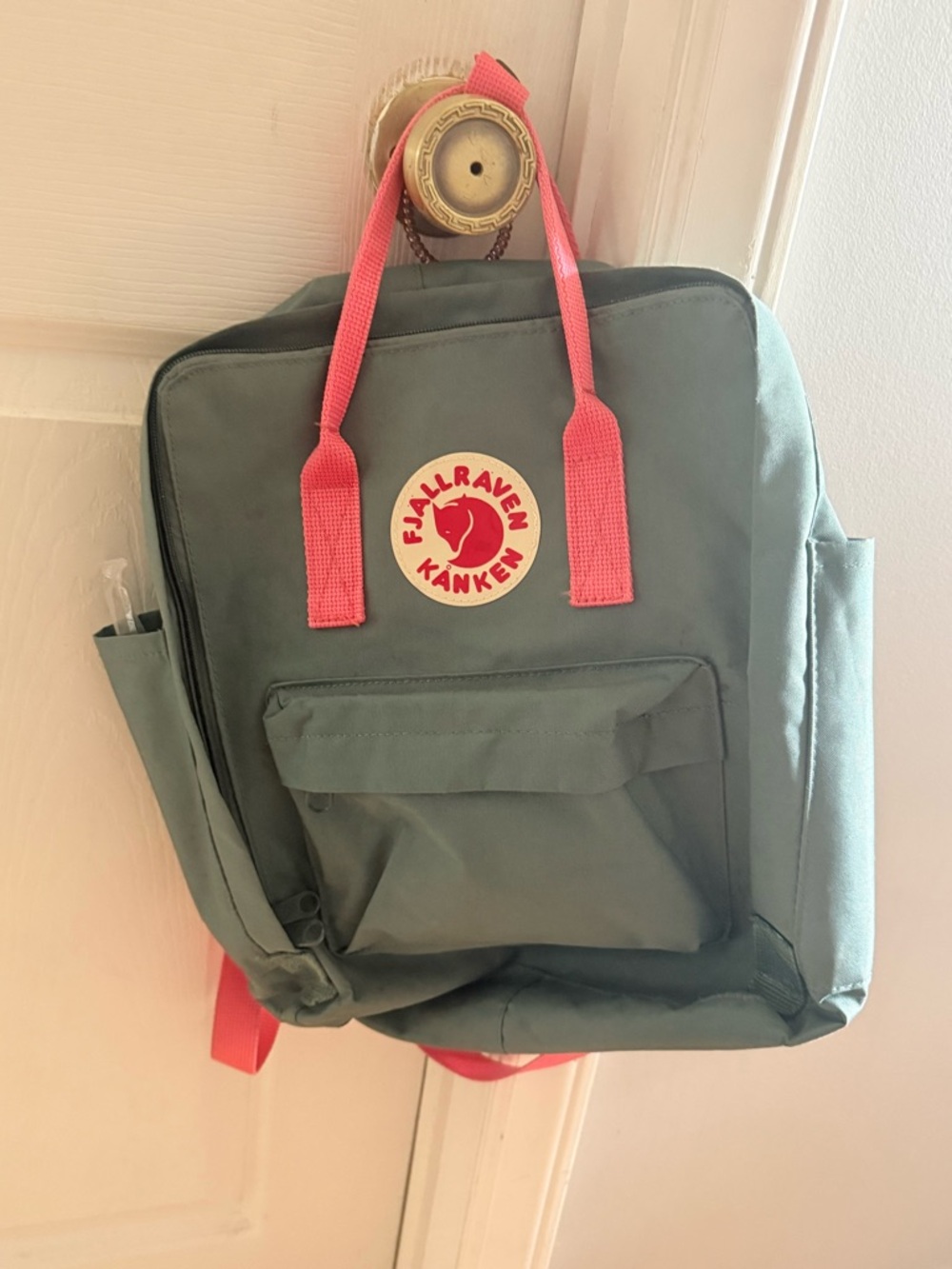 Fjallraven Kanken Backpack in Green with Pink Accents